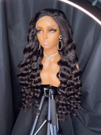 Nirila 6”6 Closure transparent Lace body wave wig-28"